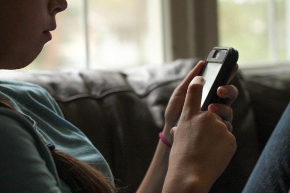 girl using a phone.