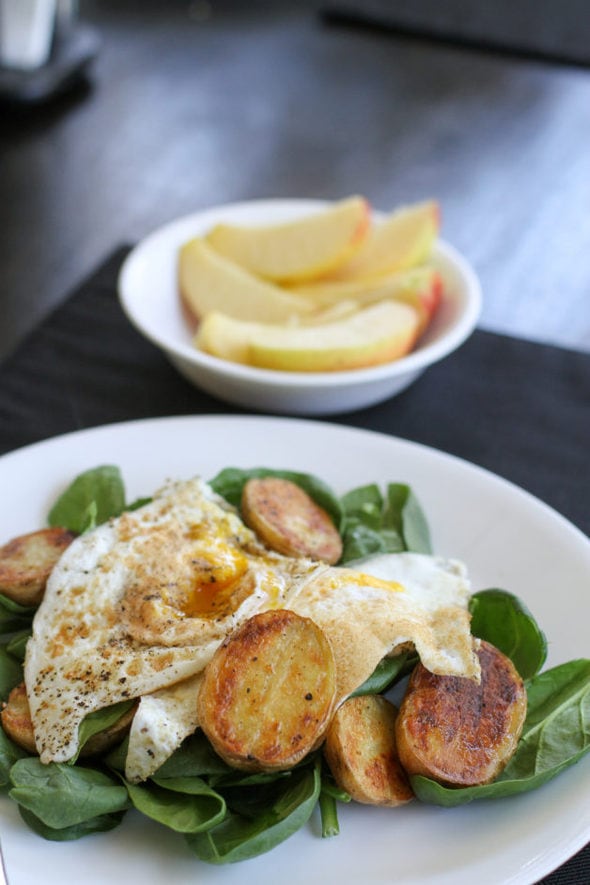 green salad with eggs and potatoes.