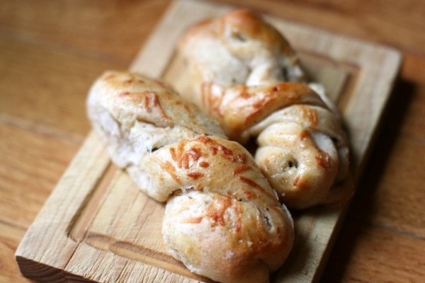 Italian cheese twists on a cutting board.